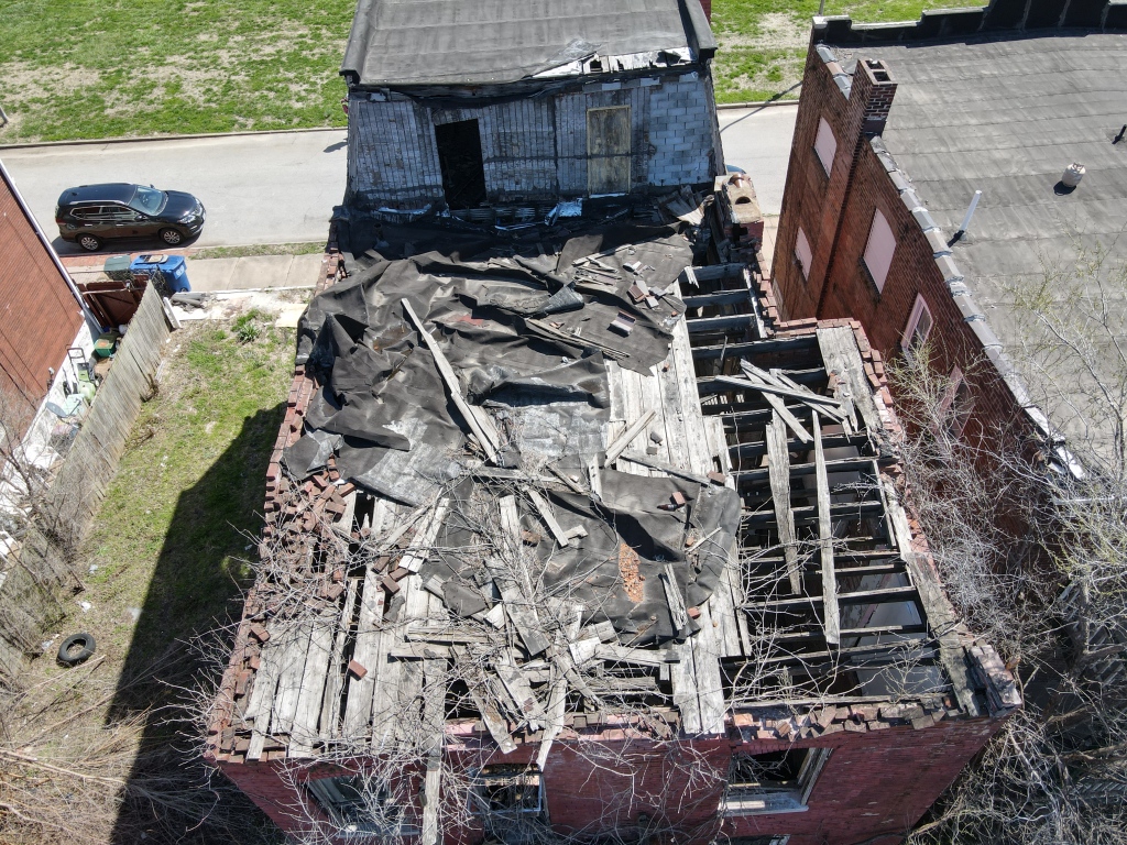 Drone aerial image documentation of devastated home